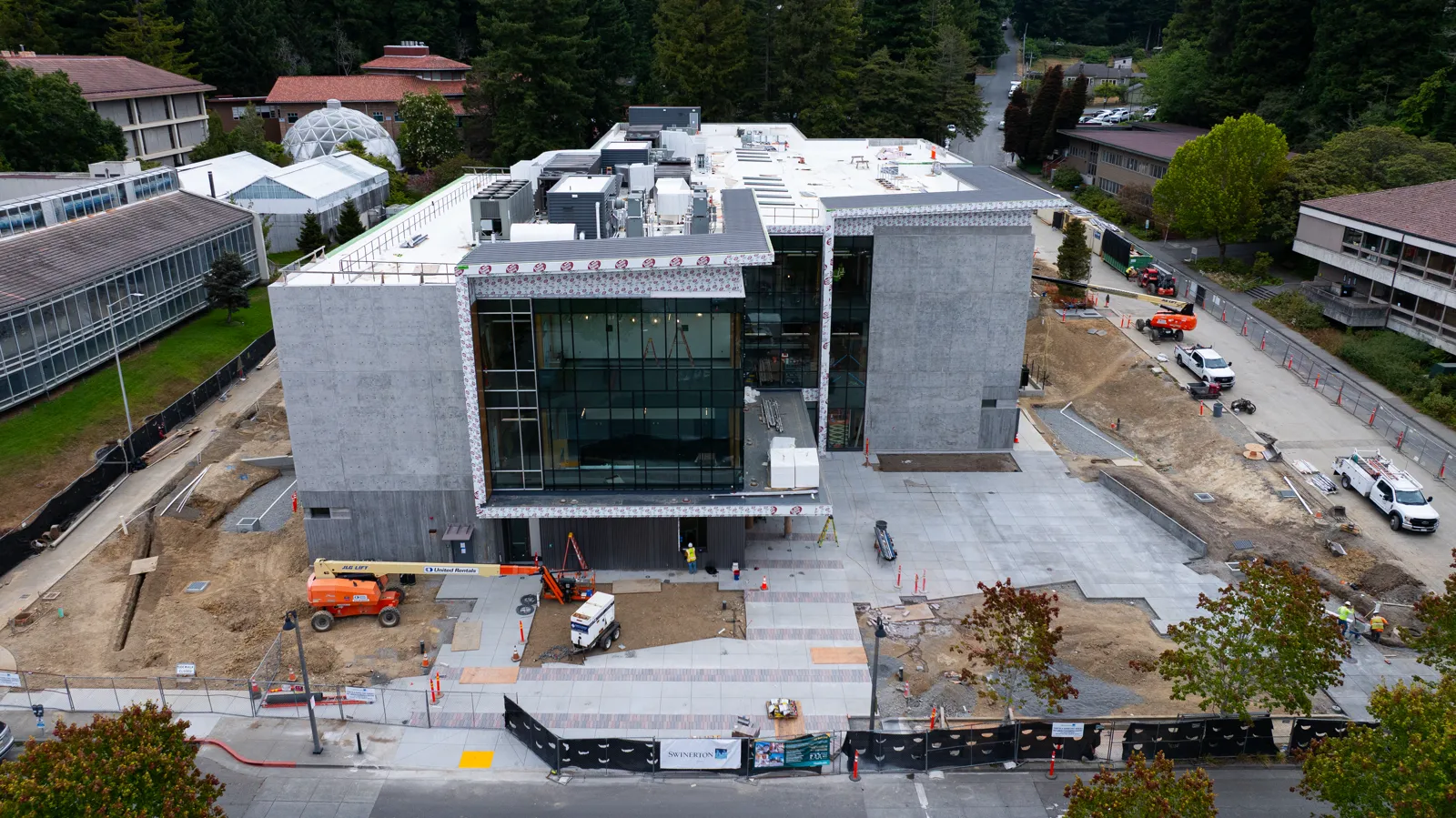 Front elevation drone aerial of an academic building nearing completion