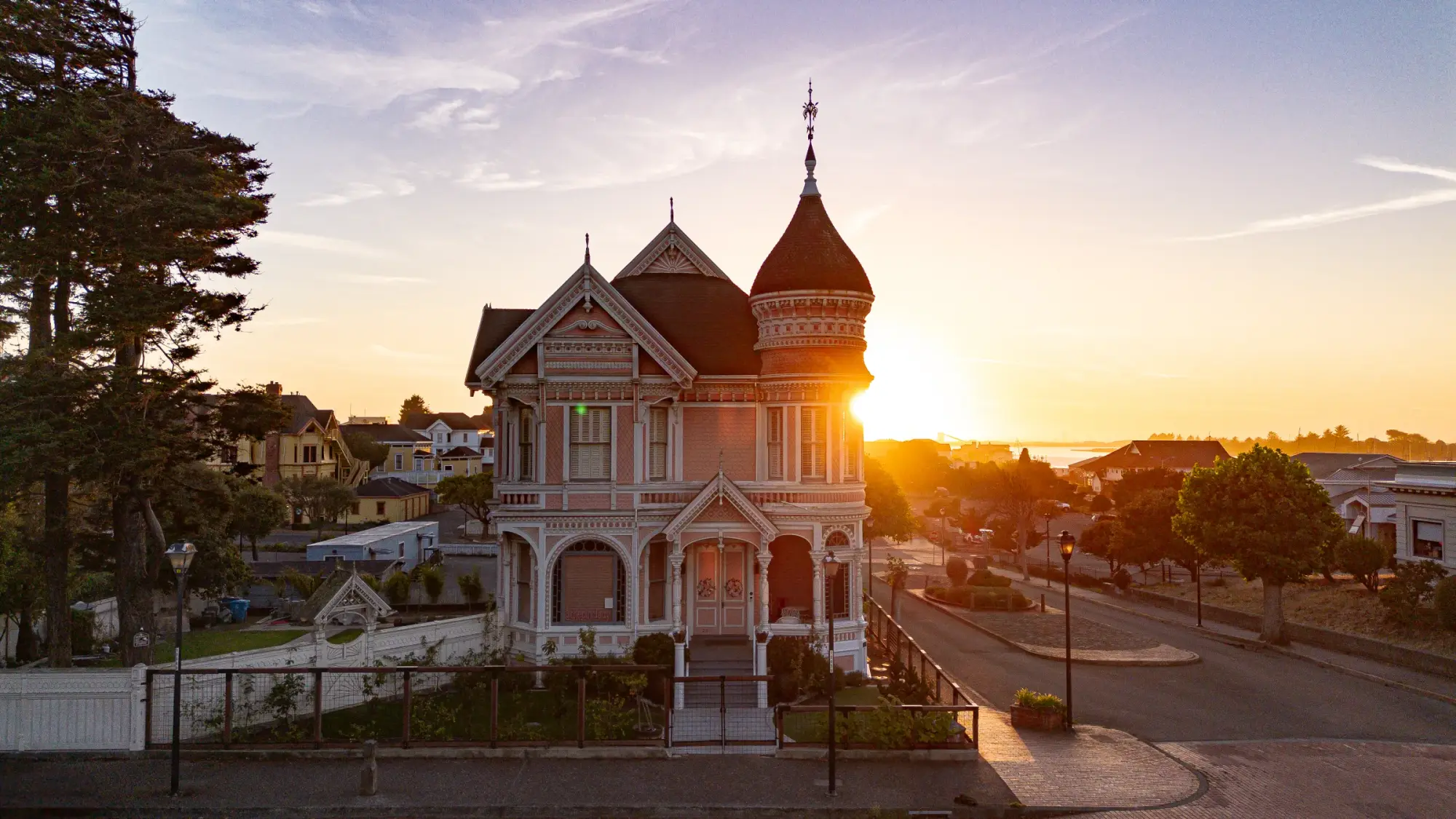 Pink Lady Victorian at sunset, drone aerial over Eureka