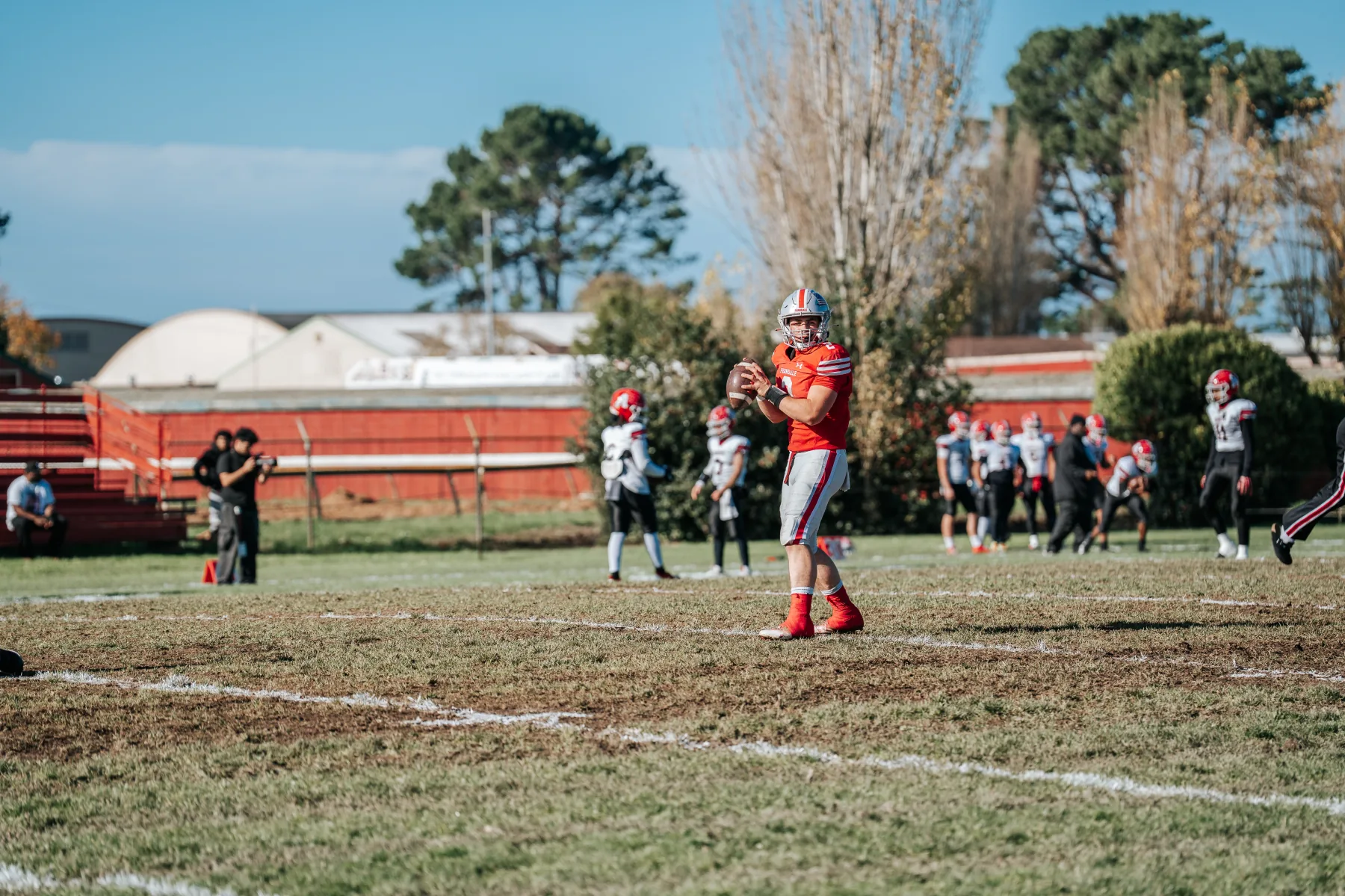 Ferndale quarterback dropping back at the home field