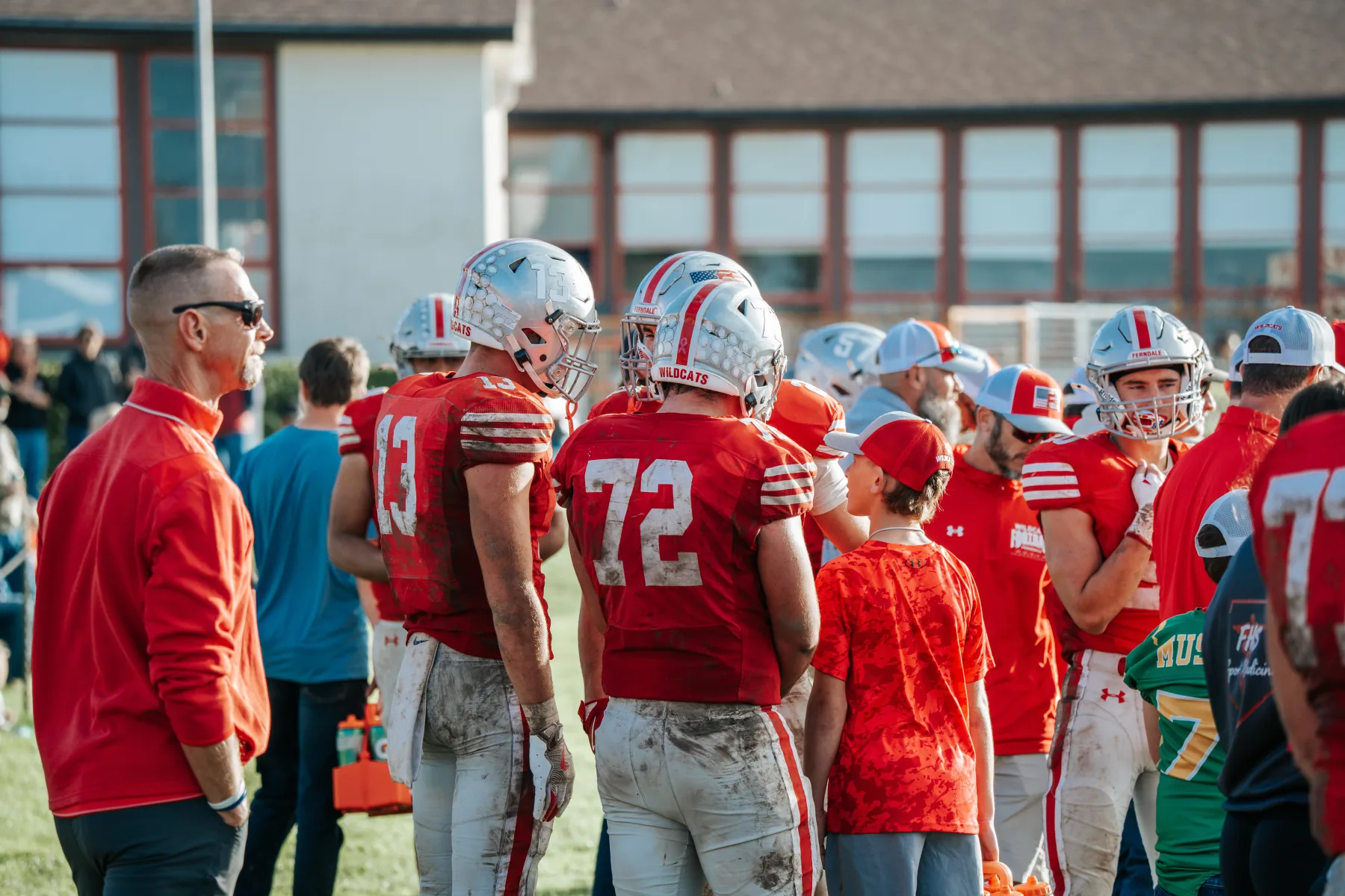 Mud-caked jerseys on the Ferndale sideline